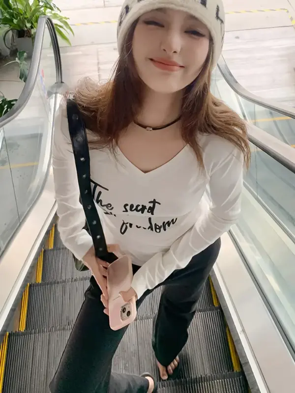 White top with black letter print